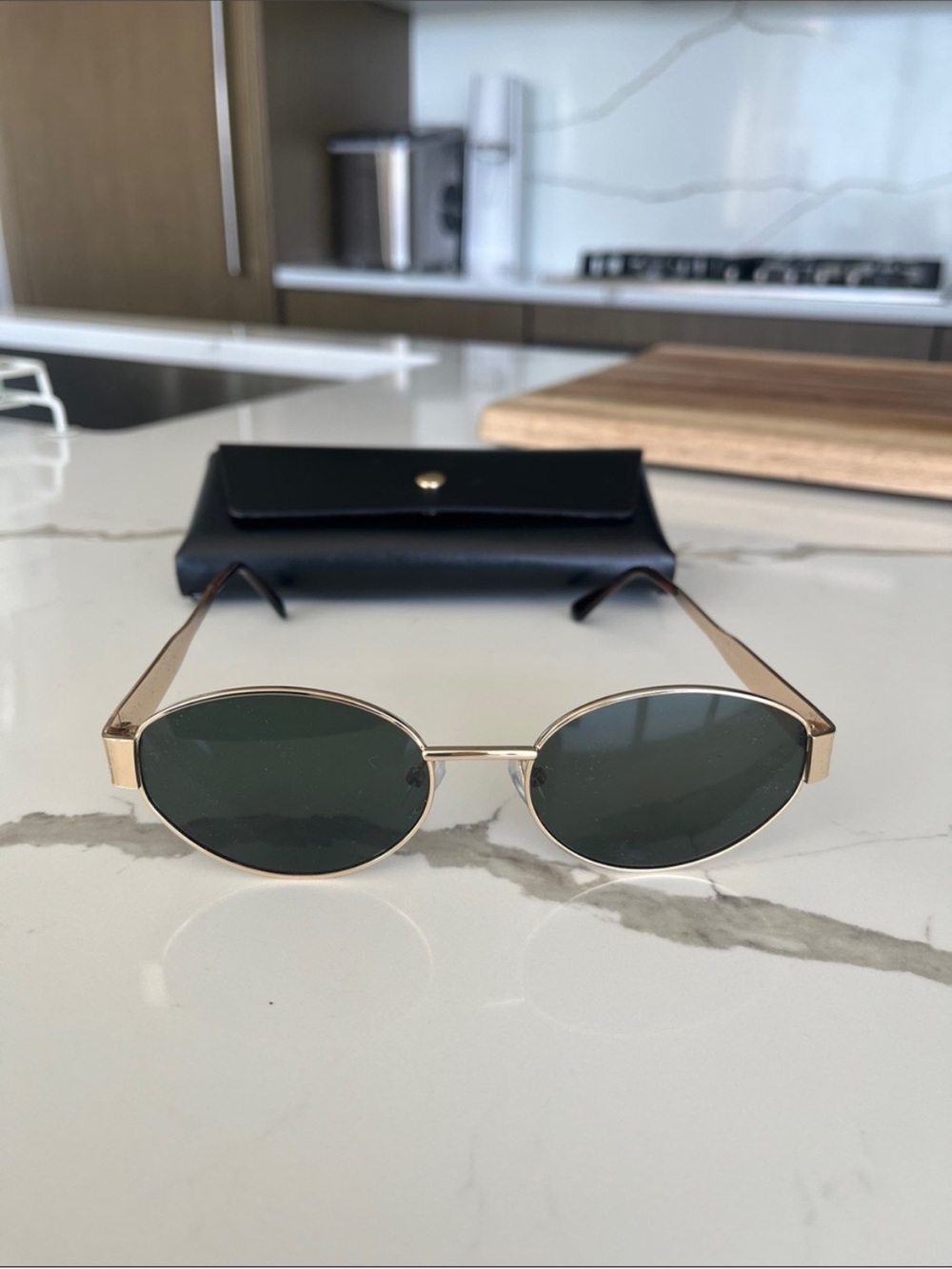 Gold Frame Oval Sunglasses